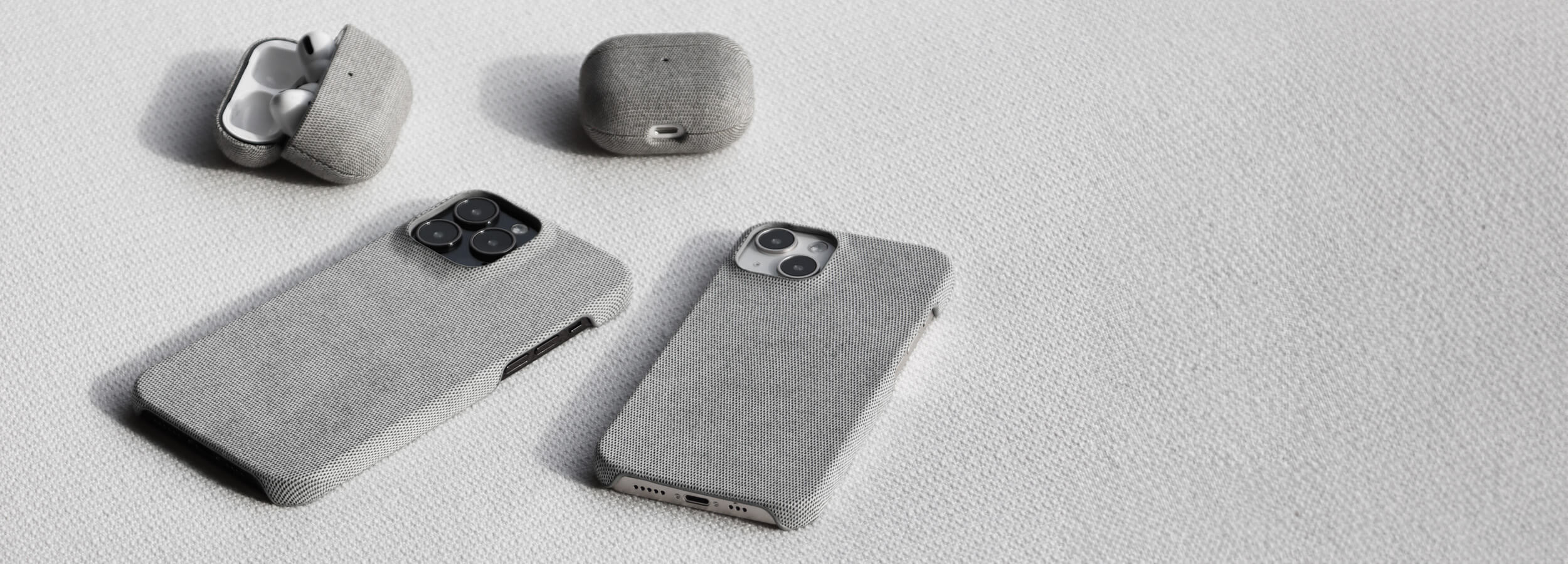 Komodoty Fabric iPhone 15 Pro Max Case Light Grey Slim Design Camera Protection Open Cutouts AirPods Cases Banner Desktop Image