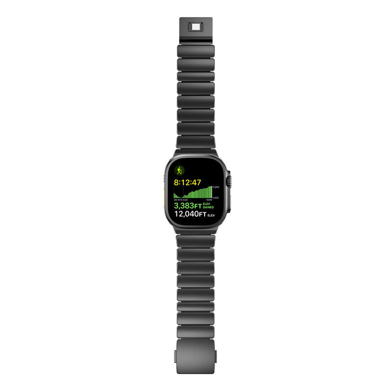 Komodoty-Titanium-Apple-Watch-Band-Black-on-Black-Rubber-Flatlay-Front on a white background
