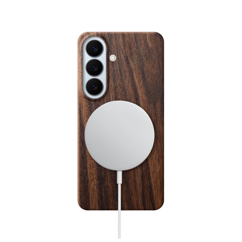 Samsung Galaxy S26 wood phone case with MagSafe charger attached on white background