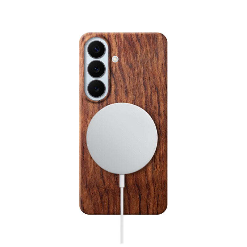Samsung Galaxy S26 wood phone case with MagSafe charger attached on white background