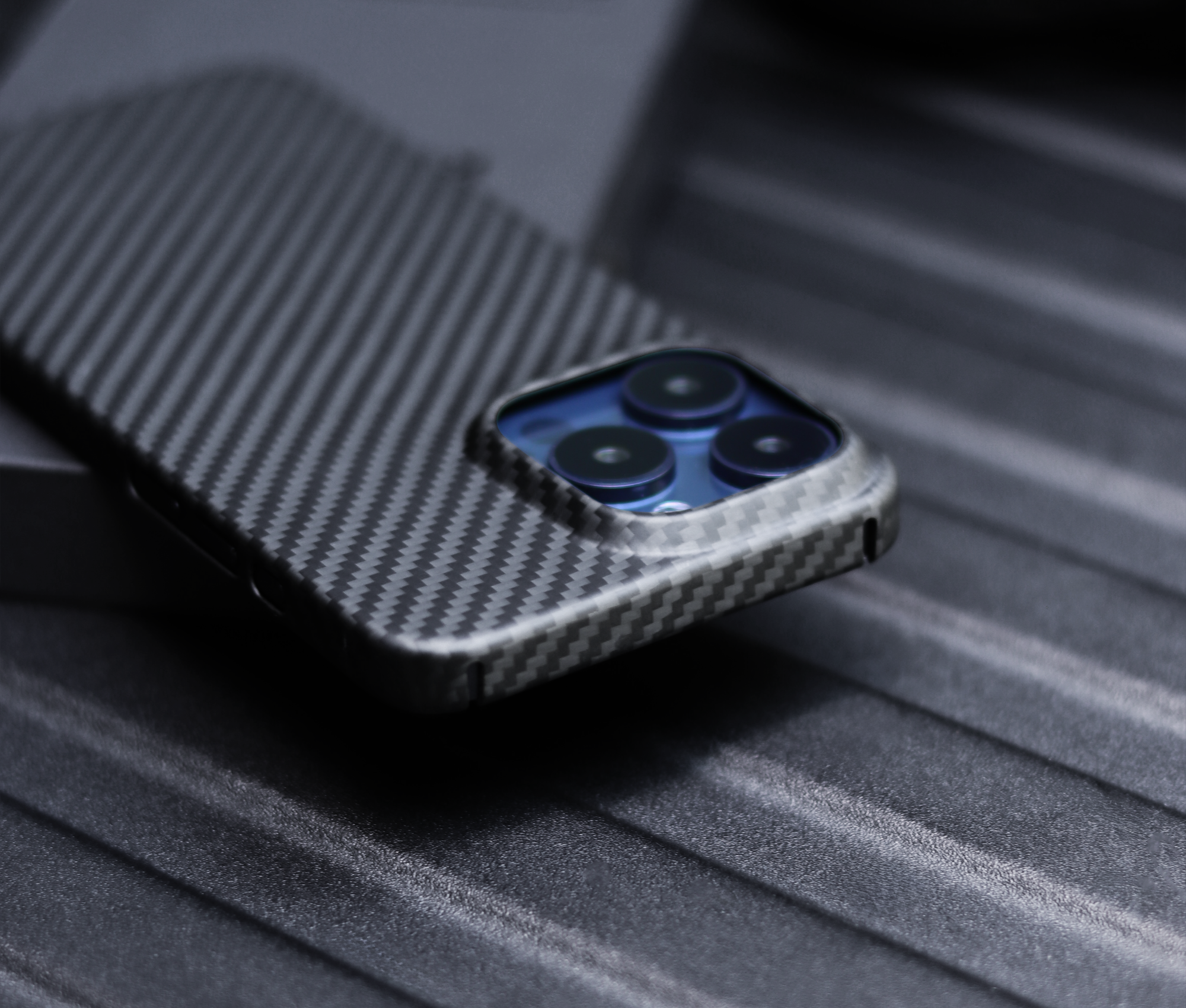 Komodoty Volaris Aramid Fiber iPhone Case iPhone 15 Pro Max Black Theme Top phone case cut out 2000 x 1700