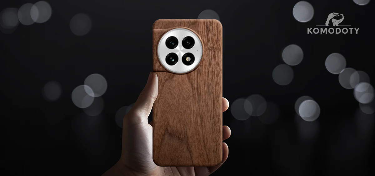 Mans hand holding OnePlus Ace 5 Pro with a Komodoty Wooden Walnut Slim Wood Case
