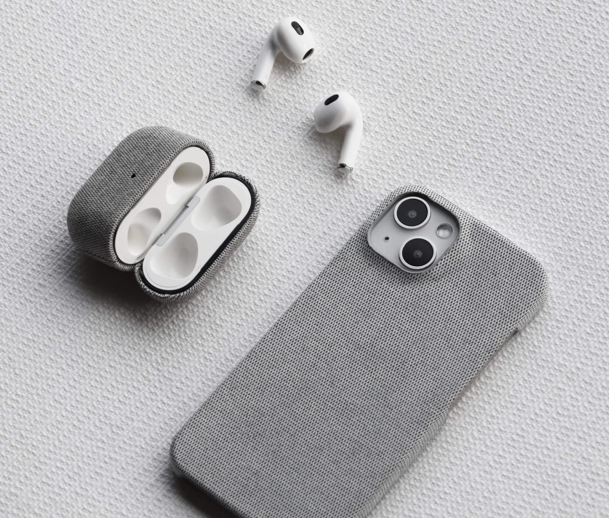 Komodoty Fabric iPhone 15 Case Light Grey Slim Design Camera Protection Accurate Cutouts AirPods Open
