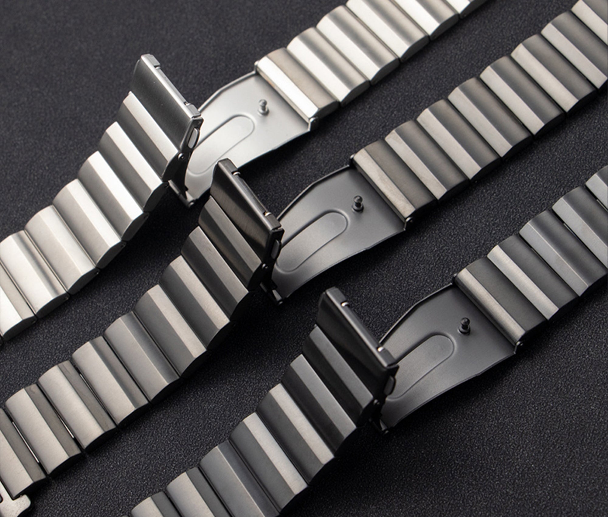 Komodoty Titanium Apple Watch Band Buckle View featuring Black, Gray and Silver